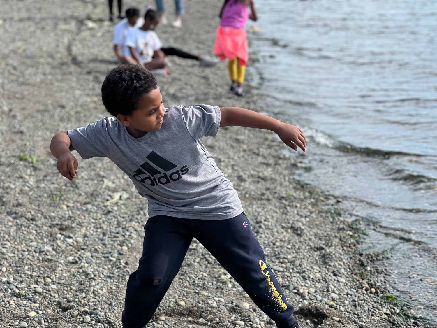 Camp Coleman 2023-9 skipping rocks at Camp Coleman